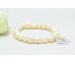 white fresh water pearls with charm bracelet